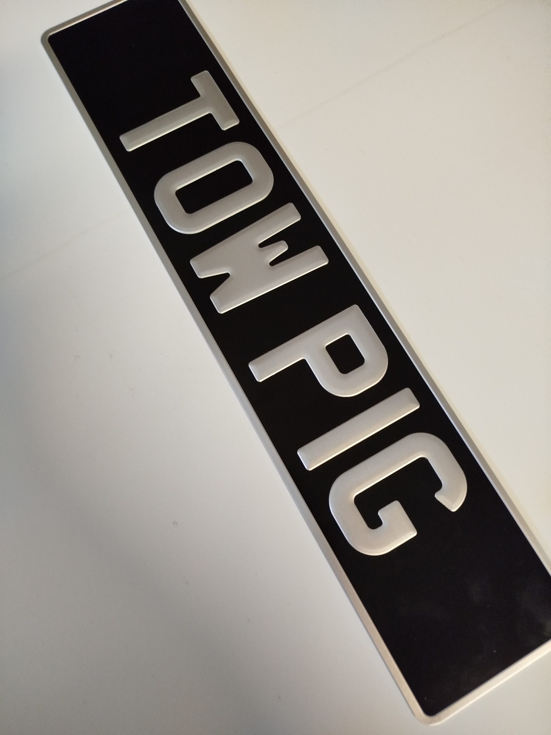 pressed number plate
